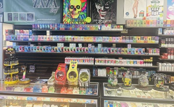 Inhale Exhale Smoke product wall featuring vape, glass, and hookah